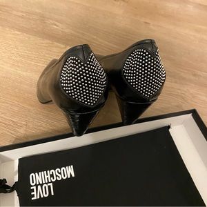 New Moschino black heels with studded heart detailing
